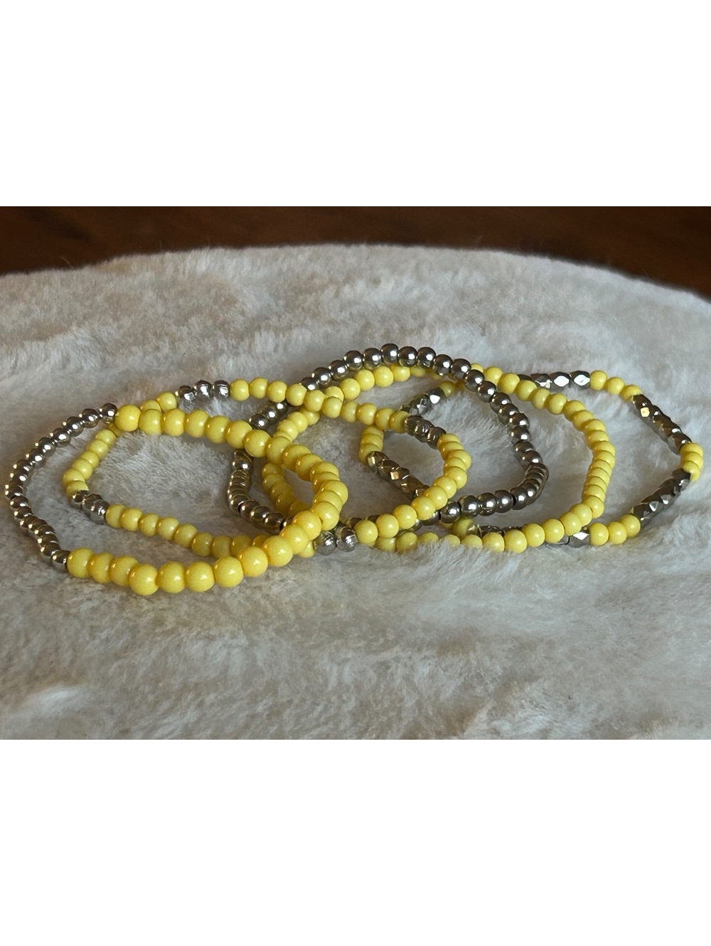 Set of Yellow and Silver Beaded Stretch Bracelets